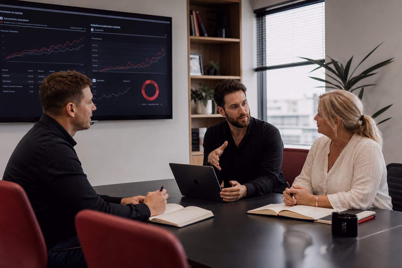Consultants reviewing an AI search audit with business owner